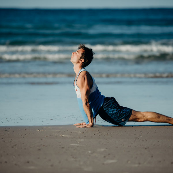 Gay Yoga Instructor posture