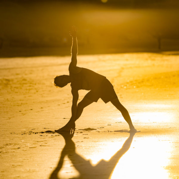 Gay Yoga Instructor sunset