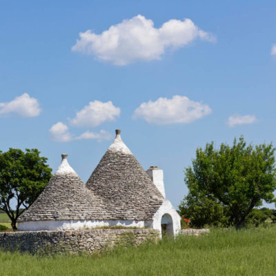 Traditional trulli drystone conical roof buildings